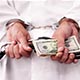 Doctor Hid Assets, Evaded $1.6M in Taxes - Now Sentenced to Prison Time